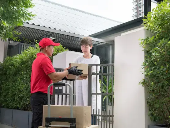 asian-delivery-man-red-uniform-delivering-parcel-boxes-woman-recipient-home_126277-829 Asian delivery man red uniform delivering parcel boxes woman recipient home 126277 829
